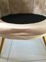 fauteuil velours avec défaut de mousse à l'avant de l'assise.